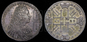 1 рубль 1729 года (голова внутри надписи, со звездой на груди, в венке ленты)
