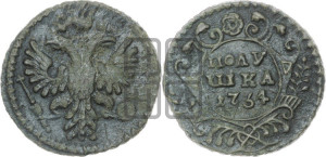 Полушка 1734 года (тип 1730 года, грудь узкая, в крыле 9-10 перьев, крест державы узорчатый)