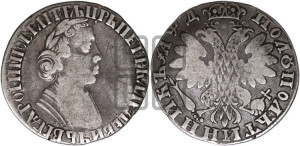 Полуполтинник 1704 года (портрет с ”узким бюстом”, голова больше, ”Пряничный орел”)