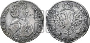 Полтина  1710 года (голова больше разделяет надпись, титул ВРП)