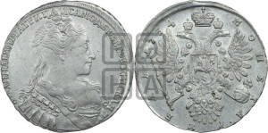 1 рубль 1734 года (голова меньше, крест короны делит надпись, одинарная складка над корсажем)