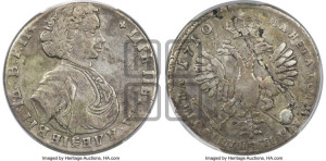 Полтина  1710 года (голова больше разделяет надпись, титул ВРП)