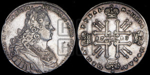 1 рубль 1728 года (голова разделяет надпись, в венке бант)