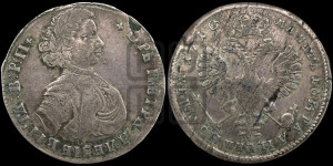 Полтина  1710 года (голова больше разделяет надпись, титул ВРП)