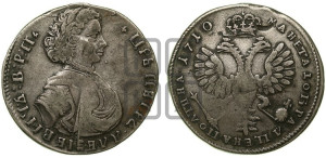 Полтина  1710 года (голова больше разделяет надпись, титул ВРП)