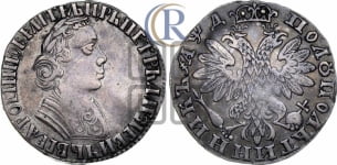 Полуполтинник 1704 года (портрет с ”узким бюстом”, голова больше, ”Пряничный орел”)